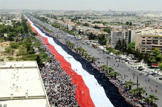 Syriens Assad avgick och uppmanar till fredlig maktöverlåtelse.